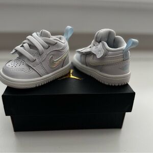 Jordan White and Silver Low-Top Sneakers